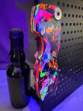 EPIC - Splatter Colors of Awesomeness - Magnetic Bottle Opener with Wax Cutter - UV Reactive